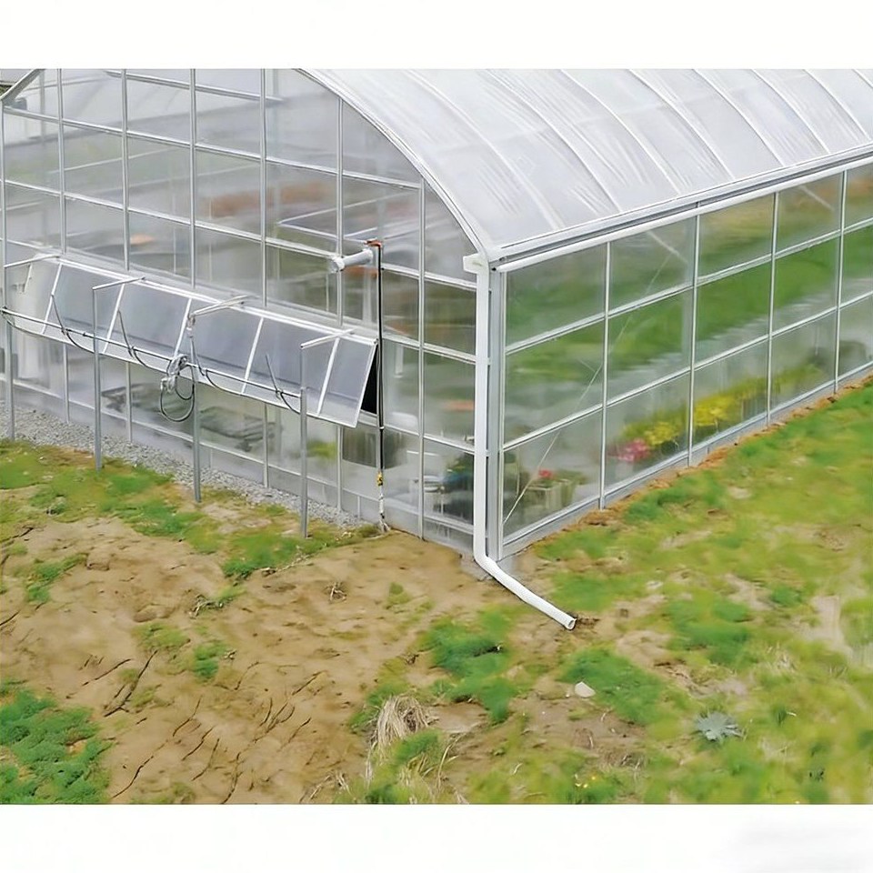 Polycarbonate greenhouse with a pitched roof and panel walls