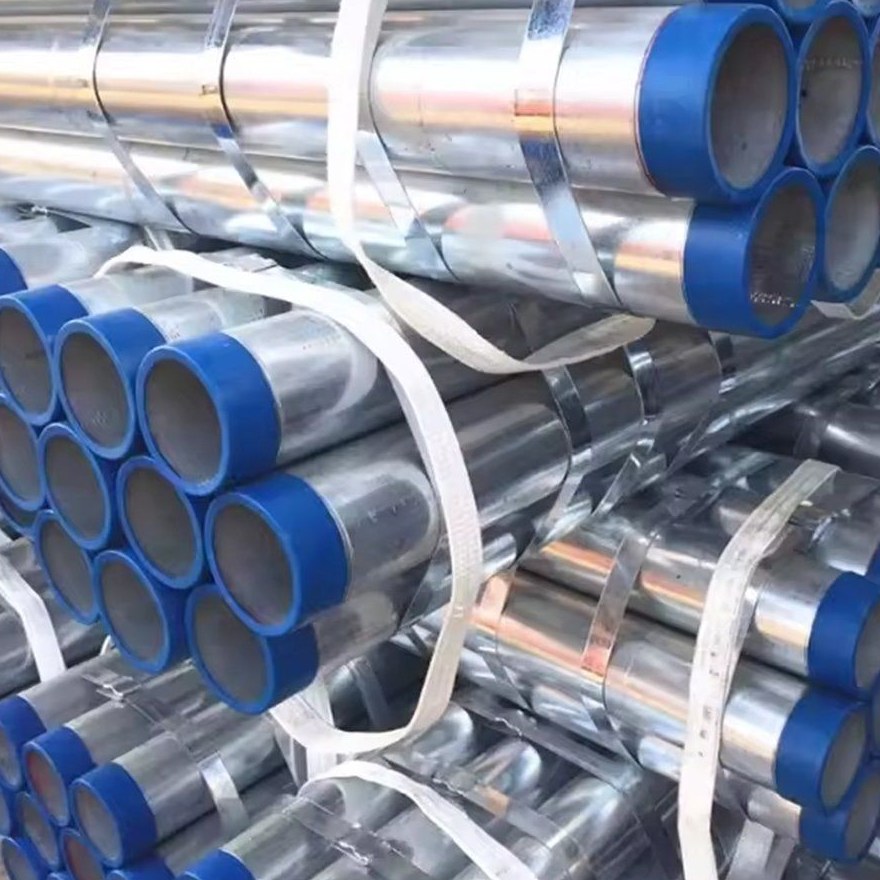 Bundle of galvanized pipes with protective end caps on the tubes
