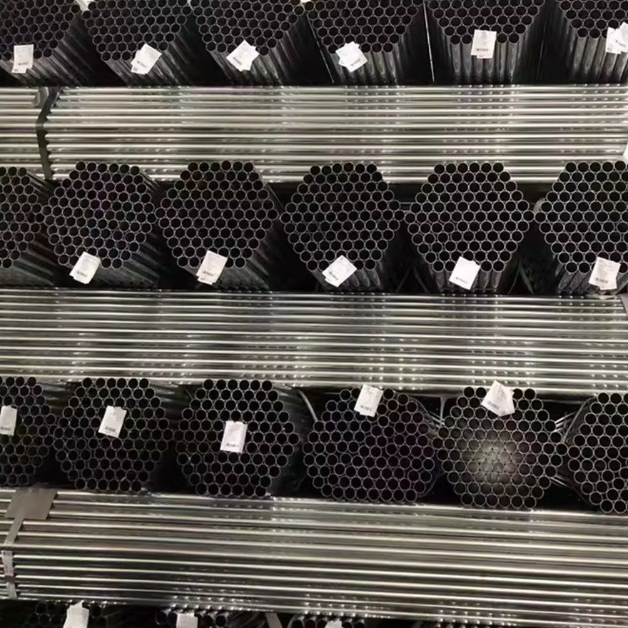 Galvanized steel pipes banded into stacks with identification tags