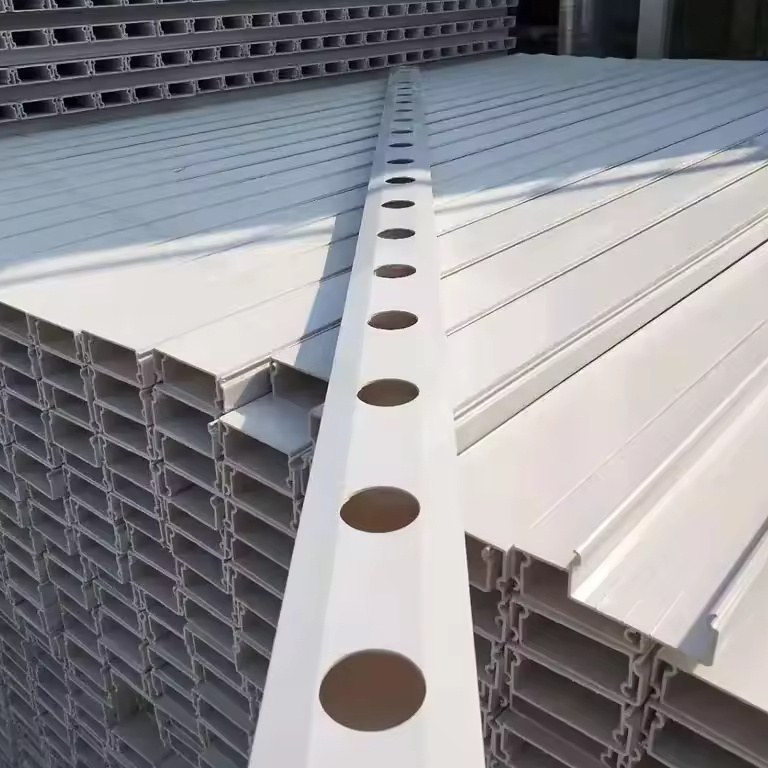 Close view of stacked white NFT channels with planting holes