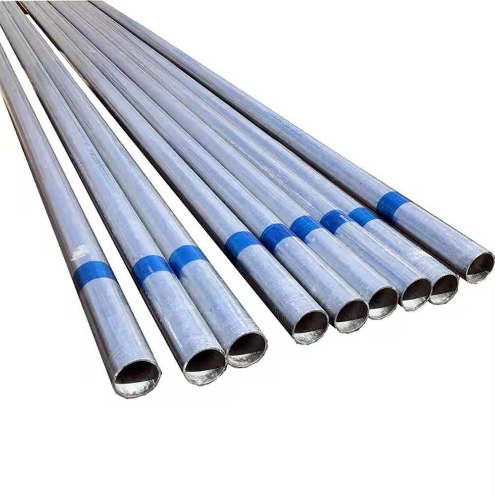 Galvanized steel pipes laid out on a plain background