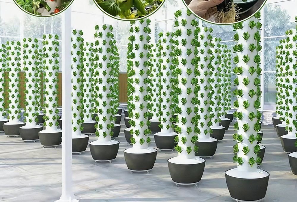 Hydroponic growing towers set out in rows inside a greenhouse
