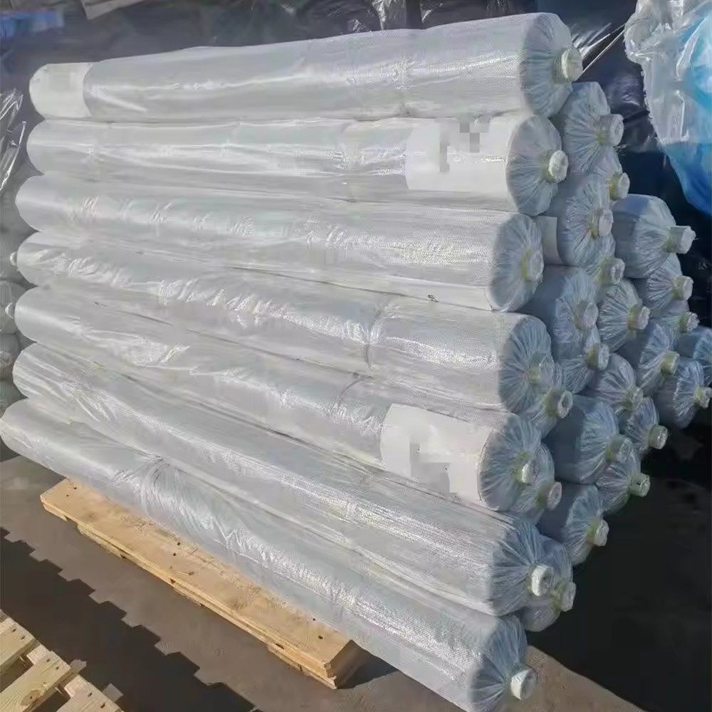 Pallet of wrapped plastic film rolls ready for greenhouse covering