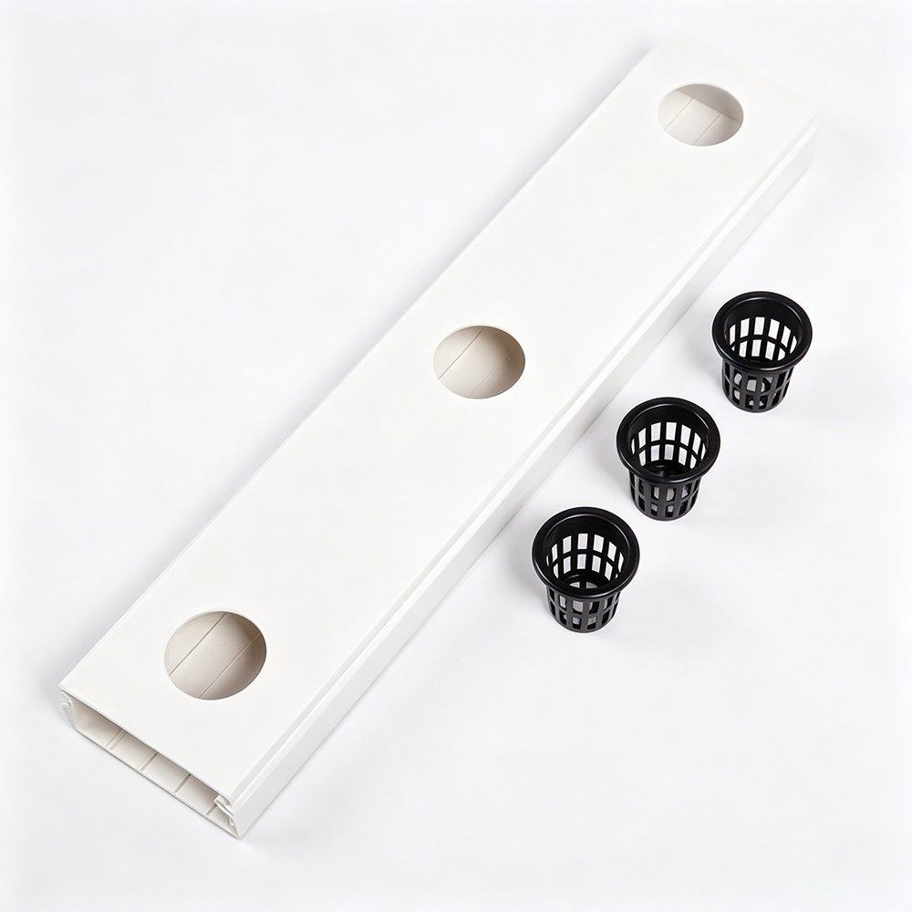 White hydroponic channel with planting openings and black net pots