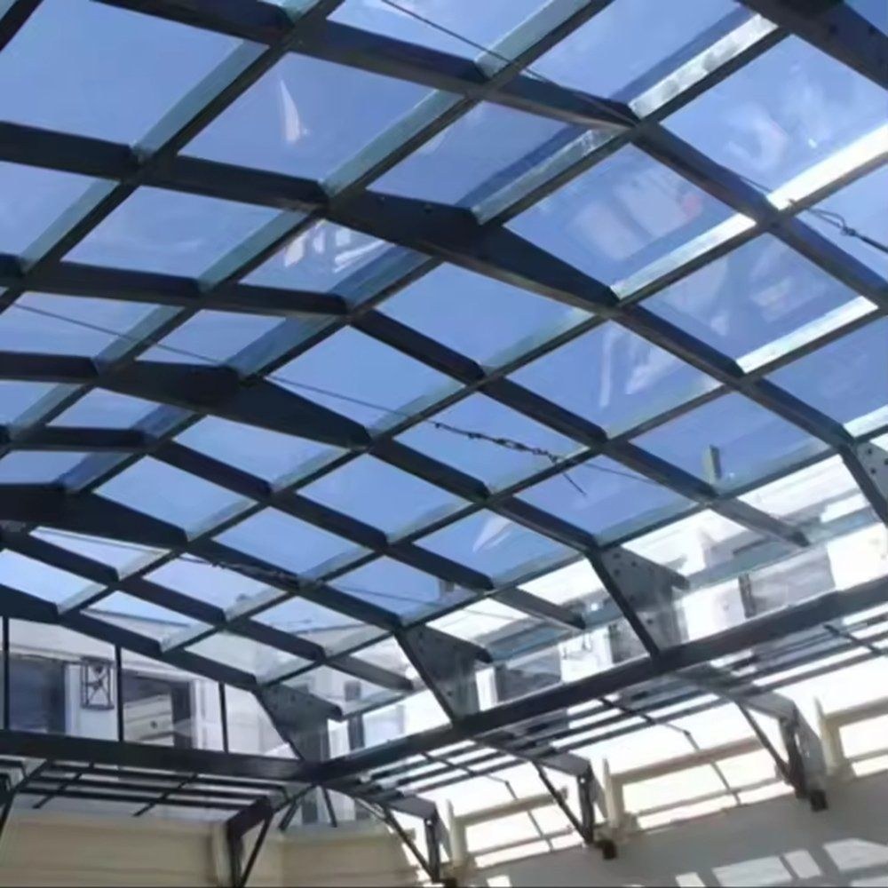 Polycarbonate sheets glazing the roof structure of a large greenhouse