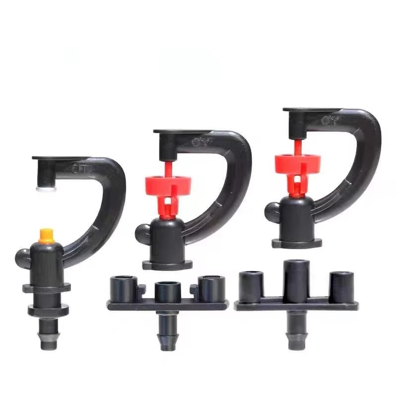Group of micro sprinkler heads with coloured adjusting rings