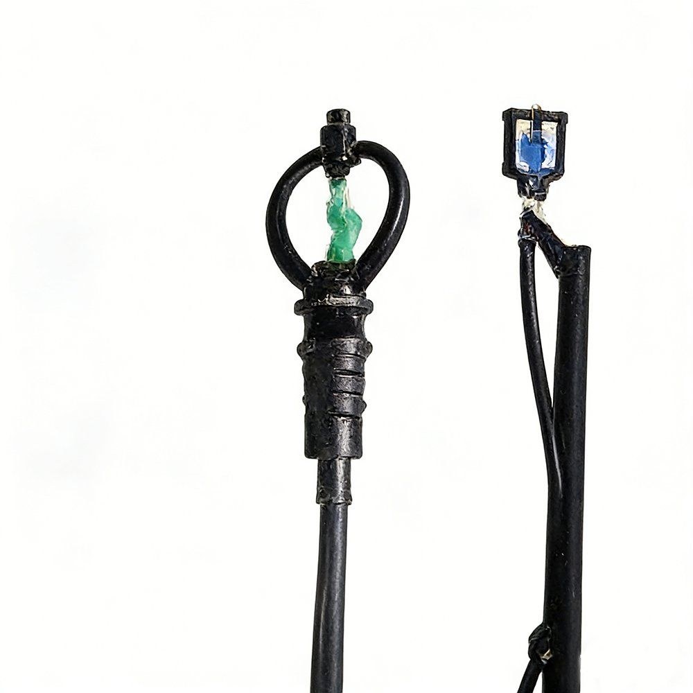 Two micro sprinkler heads with threaded bases on a white background