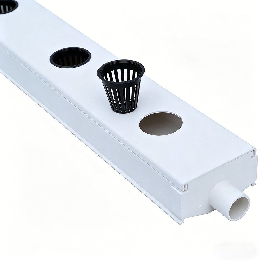 White NFT channel section with planting openings and a net pot